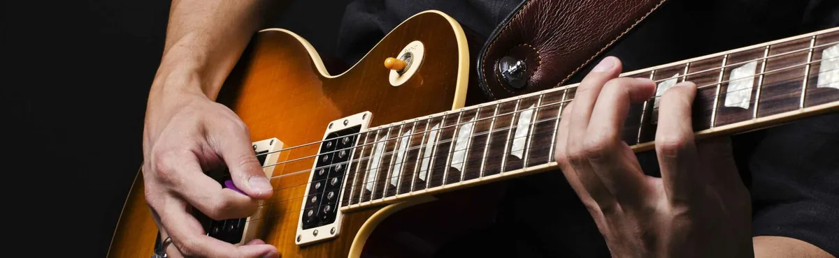 Headerbild für Gitarrenunterricht München | Lerne E-Gitarre oder klassische Gitarre spielen | Musikschule in München Neuperlach-Süd